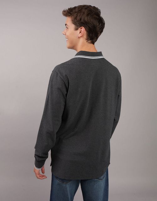 Polo de piqué elástico de manga larga con ribetes